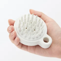 Brosse pour cuir chevelu
