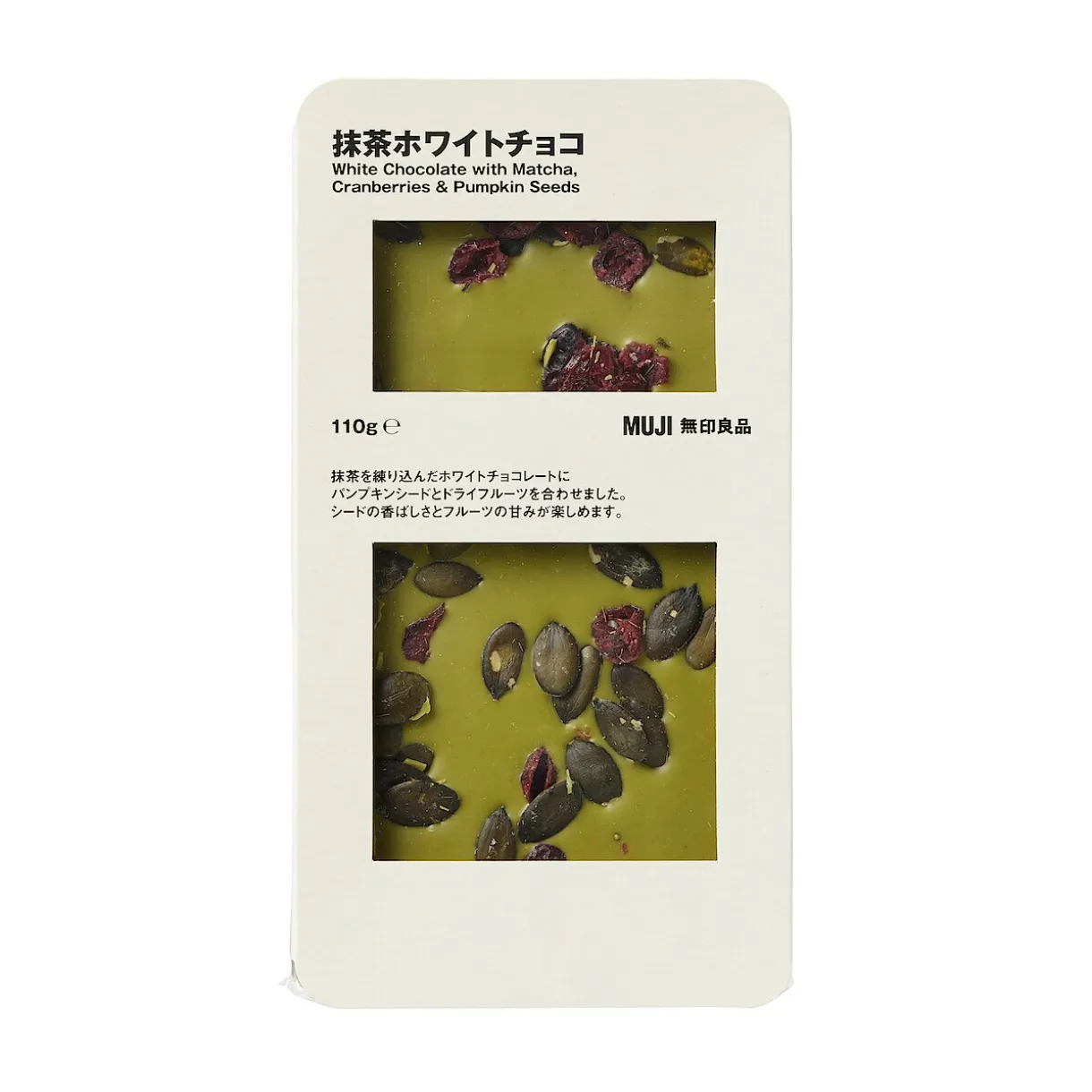 Chocolat blanc avec des canneberges sucrées, des graines de citrouille et du thé vert matcha