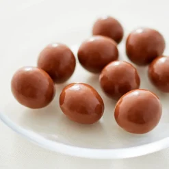 Frambroises enrobées de chocolat au lait