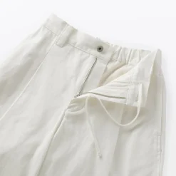 Pantalon à coupe cocon et à plis en toile de coton pour femme