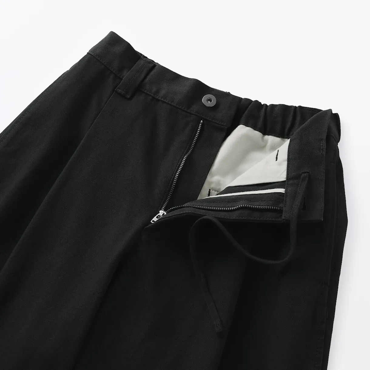 Pantalon à coupe cocon et à plis en toile de coton pour femme